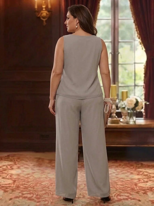Back view of the plus size lace top and taupe trousers