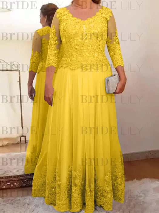 Gold plus size mother of the bride lace and tulle gown with sleeves