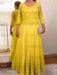 Gold plus size mother of the bride lace and tulle gown with sleeves