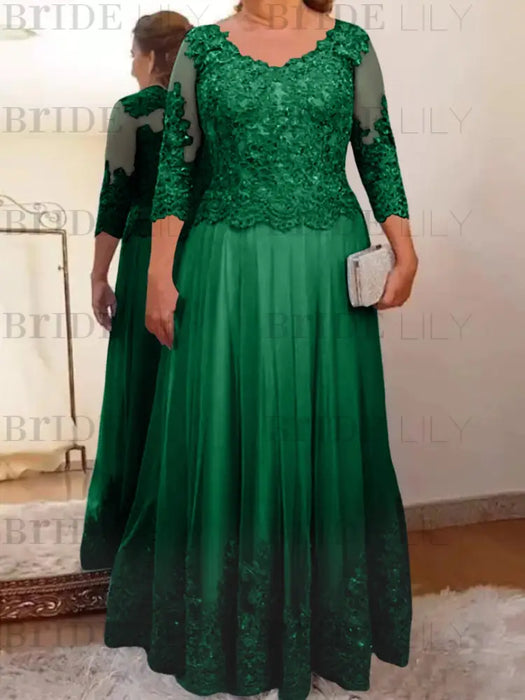 Green plus size mother of the bride lace and tulle gown with sleeves