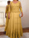 Mustard Yellow plus size mother of the bride lace and tulle gown with sleeves