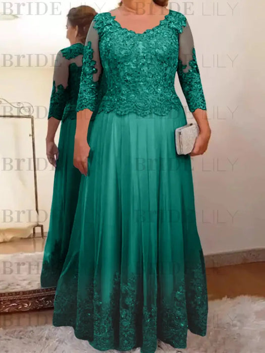 Peacock plus size mother of the bride lace and tulle gown with sleeves