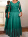 Peacock plus size mother of the bride lace and tulle gown with sleeves