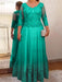 Turquoise plus size mother of the bride lace and tulle gown with sleeves