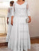 White plus size mother of the bride lace and tulle gown with sleeves