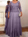 Wisteria plus size mother of the bride lace and tulle gown with sleeves