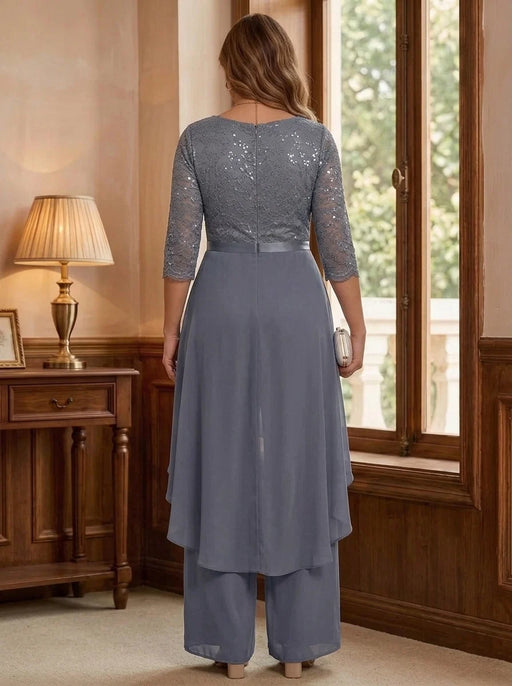 Back view of the plus size stormy grey jumpsuit with overskirt