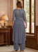 Back view of the plus size stormy grey jumpsuit with overskirt
