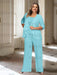 Plus size aqua chiffon pantsuit with a rosette panel and jacket