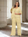 Plus size gold chiffon pantsuit with a rosette panel and jacket