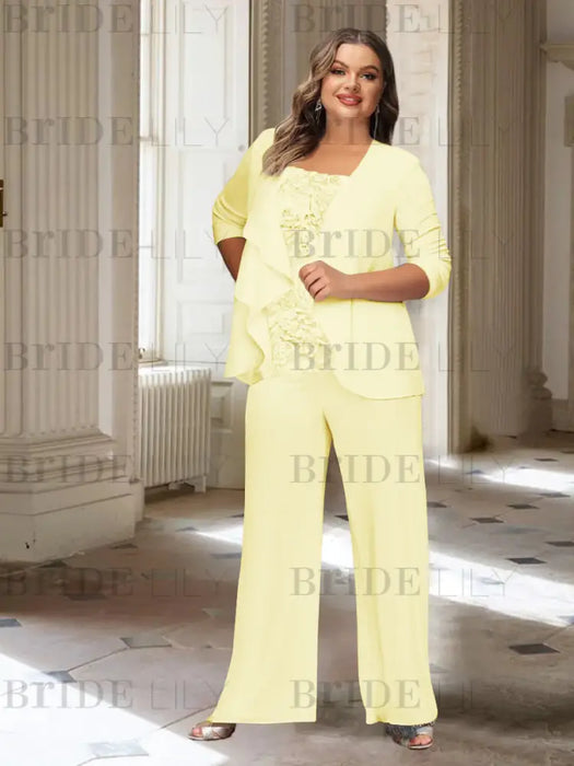 Plus size pale yellow chiffon pantsuit with a rosette panel