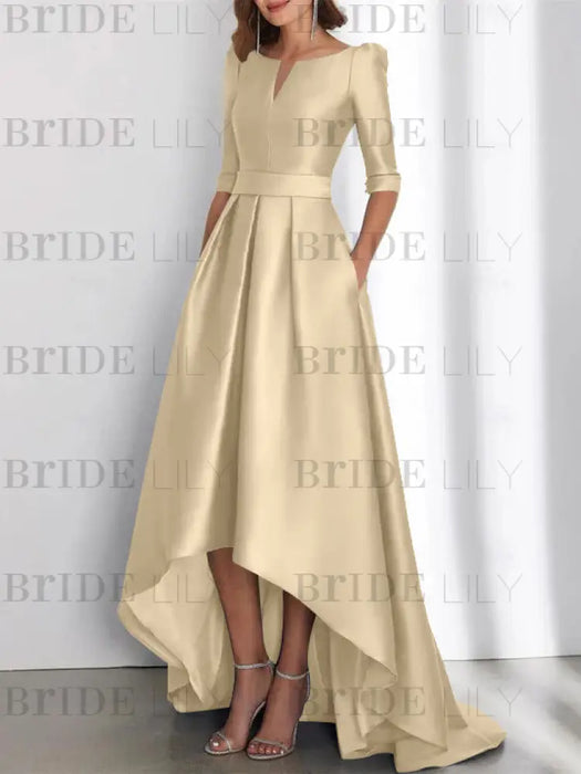 Satin dress with pockets and high low hem in champagne