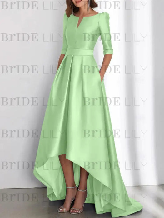 Satin dress with pockets and high low hem in mint green