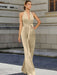 Satin halter jumpsuit with a bow belt in champagne