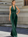 Satin halter jumpsuit with a bow belt in emerald green