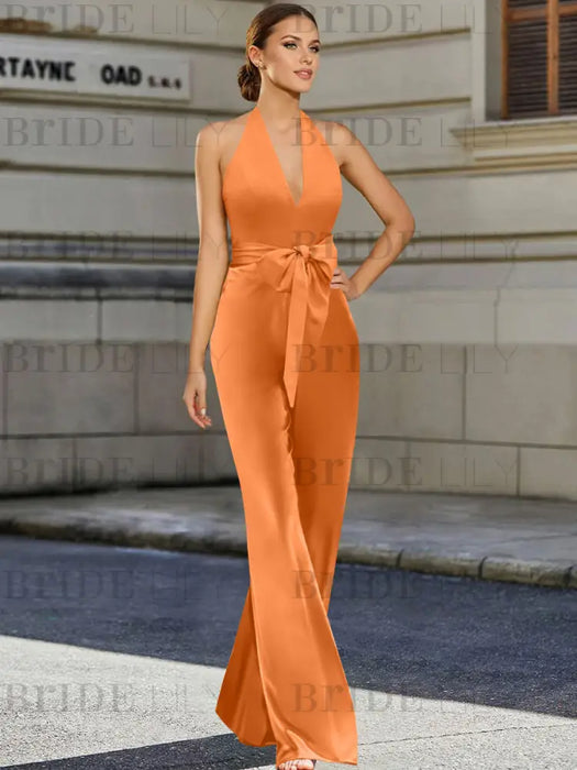 Orange halter neck satin mother of the bride jumpsuit with bow belt