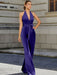 Satin halter jumpsuit with a bow belt in purple