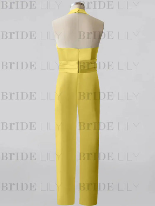 Back view of the satin halter jumpsuit on a dress form in yellow
