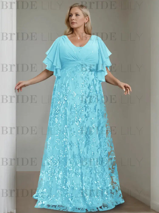 Plus size aqua gown with a chiffon bodice and sequin damask skirt