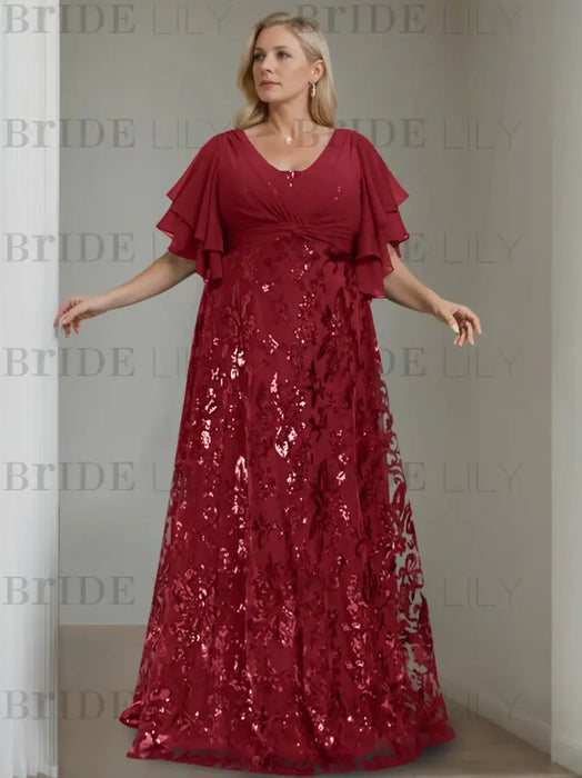 Plus size burgundy gown with a chiffon bodice and sequin damask skirt