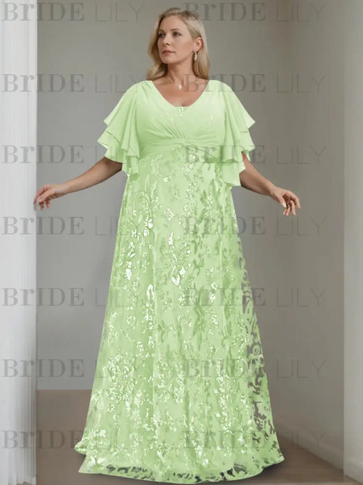 Plus size light green gown with a chiffon bodice and damask skirt