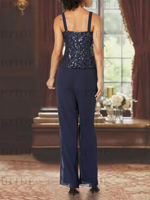 Back view of navy sequin lace camisole and chiffon trousers