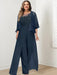 Plus size navy lace bodice jumpsuit with a chiffon cape jacket