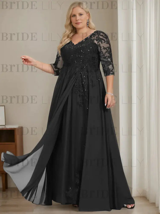 Plus size black sequin lace gown with a draped chiffon sash