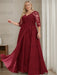 Plus size burgundy sequin lace gown with a draped chiffon sash