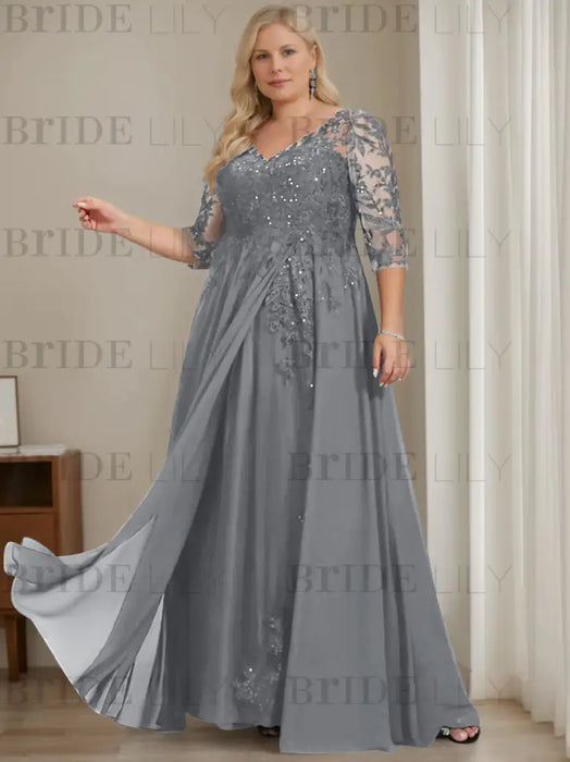 Plus size grey sequin lace gown with a draped chiffon sash