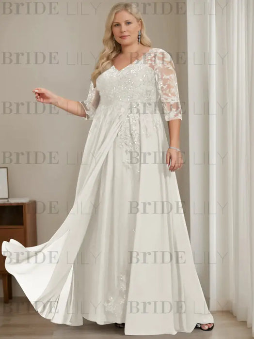 Plus size ivory sequin lace gown with a draped chiffon sash