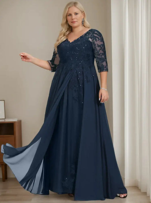 Plus size navy sequin lace gown with a draped chiffon sash