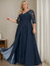 Plus size navy sequin lace gown with a draped chiffon sash