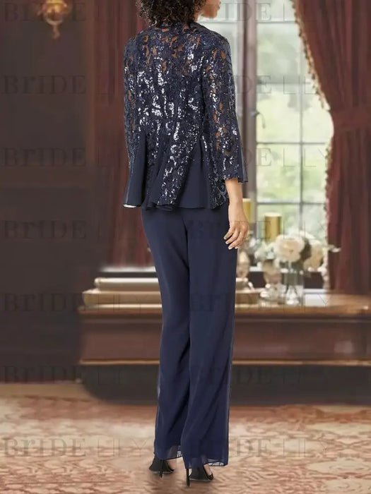 Back view of navy sequin lace jacket and wide-leg chiffon trousers