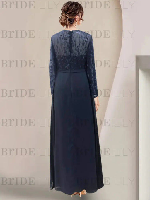 Back view of the navy sequin leaf embroidered chiffon gown