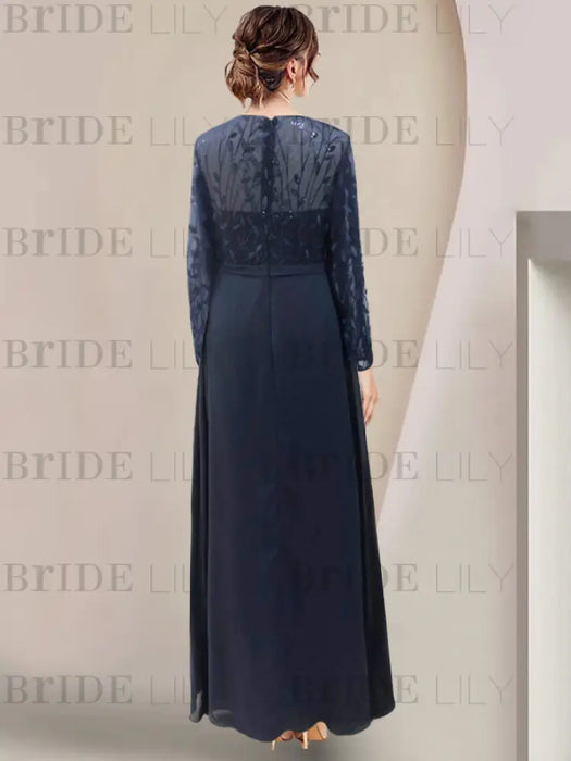 Back view of the navy sequin leaf embroidered chiffon gown