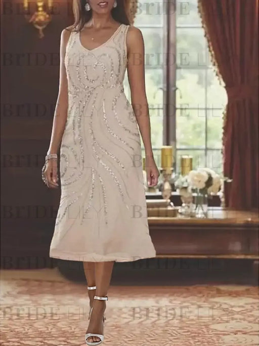 Champagne chiffon dress shown without the jacket