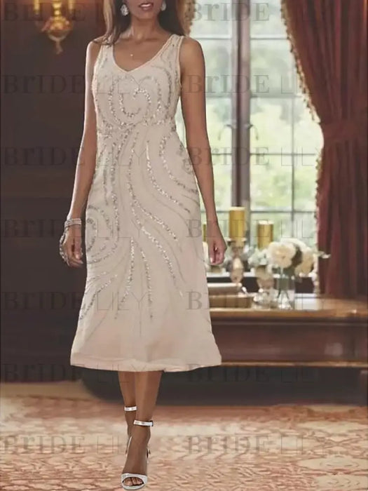 Champagne chiffon dress shown without the jacket