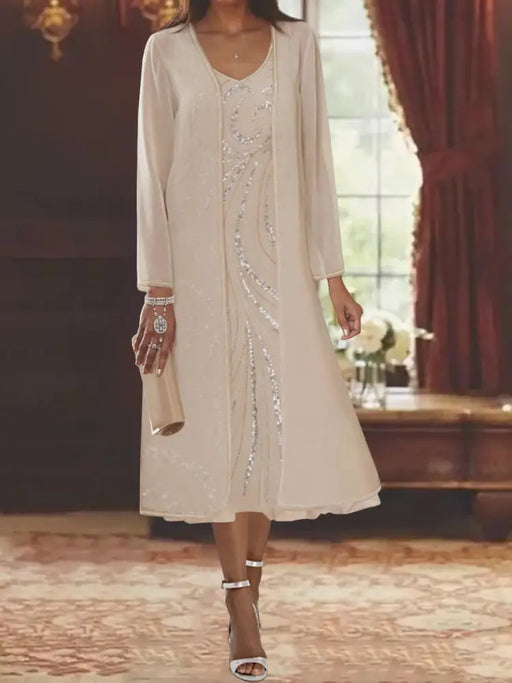 Champagne chiffon tea length dress worn with its long jacket