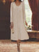 Champagne chiffon tea length dress worn with its long jacket