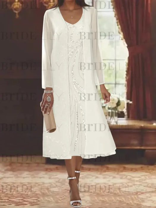 Ivory chiffon tea length dress with a sequin swirl and jacket