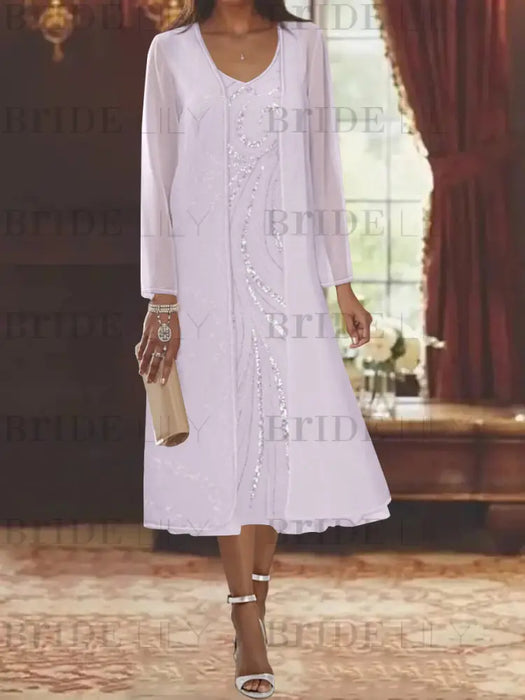 Lilac chiffon tea length dress with a sequin swirl and jacket