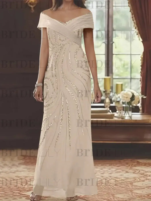 Sequin swirl embroidered chiffon column gown in champagne