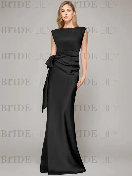 Sleeveless satin sheath gown with a ruched bow sash in black