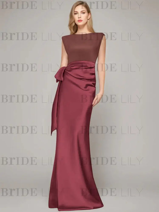 Sleeveless satin sheath gown with a brown bodice and wine satin skirt