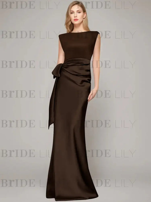 Sleeveless satin sheath gown with a ruched bow sash in chocolate brown