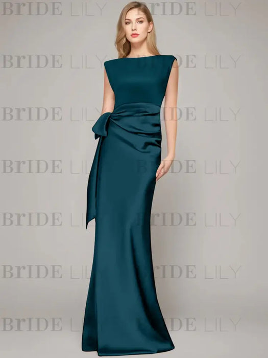 Sleeveless satin sheath gown with a ruched bow sash in deep teal