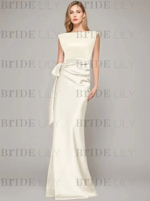 Sleeveless satin sheath gown with a ruched bow sash in ivory