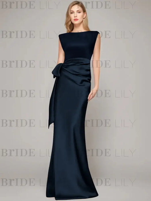 Sleeveless satin sheath gown with a ruched bow sash in navy