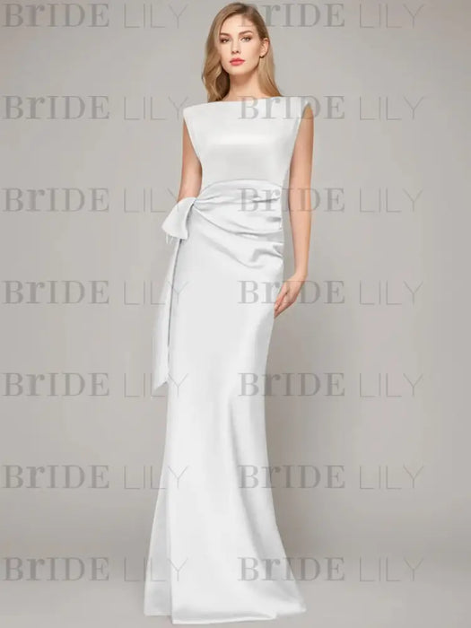 White sleeveless satin mother of the bride gown with ruched bow sash